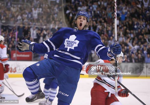 Josh Leivo of the Toronto Maple Leafs celebrates as he scores his first career NHL goal during NHL game action against the Carolina Hurricanes at Air...