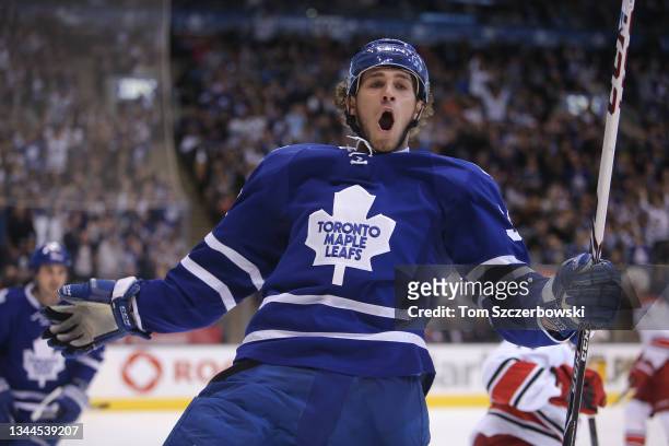 Josh Leivo of the Toronto Maple Leafs celebrates as he scores his first career NHL goal during NHL game action against the Carolina Hurricanes at Air...
