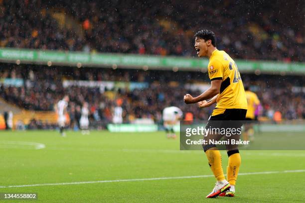 Hwang Hee-chan of Wolverhampton Wanderers celebrates after scoring their team's second goal during the Premier League match between Wolverhampton...