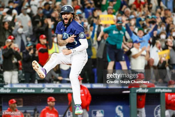 Crawford of the Seattle Mariners reacts after scoring on a single by Mitch Haniger during the eighth inning against the Los Angeles Angels at...