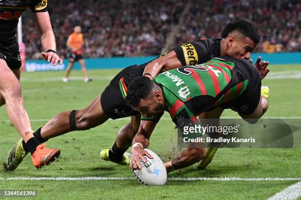 Alex Johnston of the Rabbitohs scores a try during the 2021 NRL Grand Final match between the Penrith Panthers and the South Sydney Rabbitohs at...