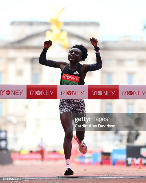 Joyciline Jepkosgei of Kenya celebrates winning the Women's Elite Race during the 2021 Virgin Money London Marathon at Tower Bridge on October 03,...