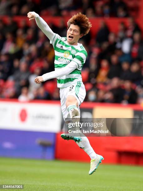 Kyogo Furuhashi of Celtic celebrates after scoring their side's first goal during the Ladbrokes Scottish Premiership match between Aberdeen and...