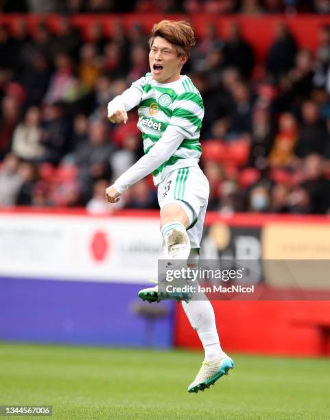 Kyogo Furuhashi of Celtic celebrates after scoring their side's first goal during the Ladbrokes Scottish Premiership match between Aberdeen and...
