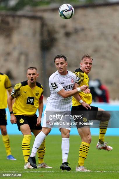 Mirnes Pepic of Wuerzburg and Lennard Maloney of Dortmund go up for a headerduring the 3. Liga match between Borussia Dortmund II and Würzburger...
