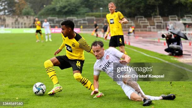 Mirnes Pepic of Wuerzburg challenges Ansgar Knauff of Dortmund during the 3. Liga match between Borussia Dortmund II and Würzburger Kickers at...