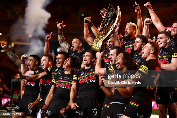 The Panthers celebrate with the NRL Premiership Trophy after victory in the 2021 NRL Grand Final match between the Penrith Panthers and the South...