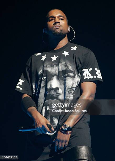 Musician Kanye West performs during the "Watch The Throne" tour at Sprint Center on November 29, 2011 in Kansas City, Missouri.