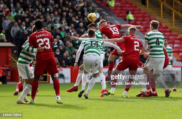 Lewis Ferguson of Aberdeen scores their side's first goal during the Ladbrokes Scottish Premiership match between Aberdeen and Celtic at Pittodrie...