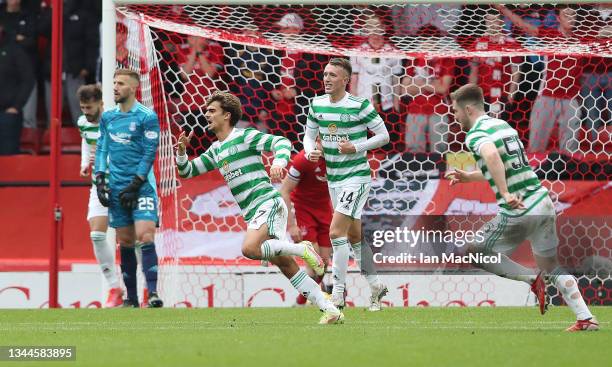 Jota of Celtic celebrates after scoring his team's second goal during the Ladbrokes Scottish Premiership match between Aberdeen and Celtic at...
