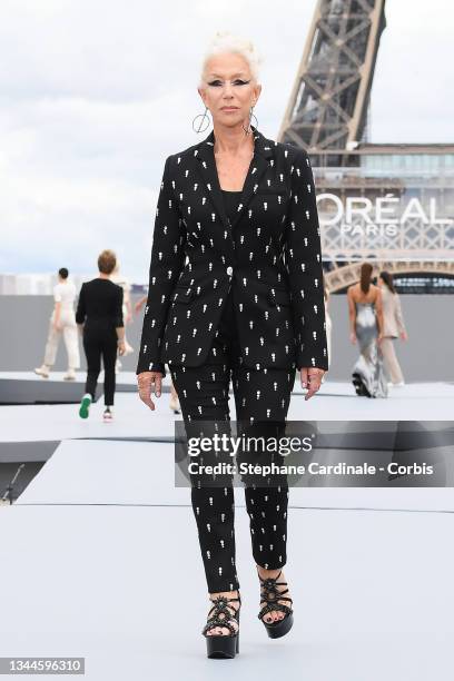 Helen Mirren walks the runway during the "Le Defile L'Oreal Paris 2021" Womenswear Spring/Summer 2022 show as part of Paris Fashion Week on October...