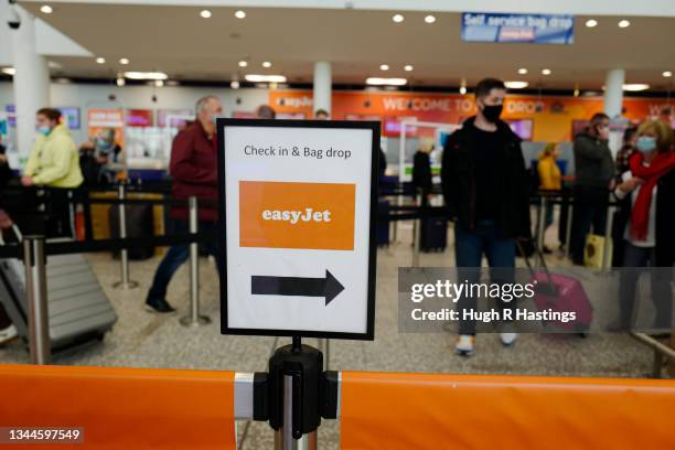 Close up view of queue barriers in the departures hall at Bristol Airport on October 03, 2021 in Bristol, England. Starting tomorrow, the United...