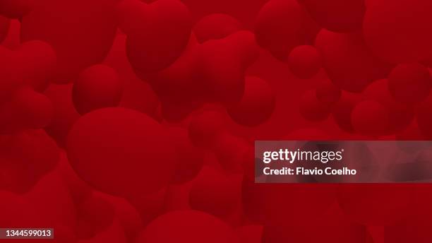 low contrast red blobs floating and mixing filling the frame - blood love stock-fotos und bilder