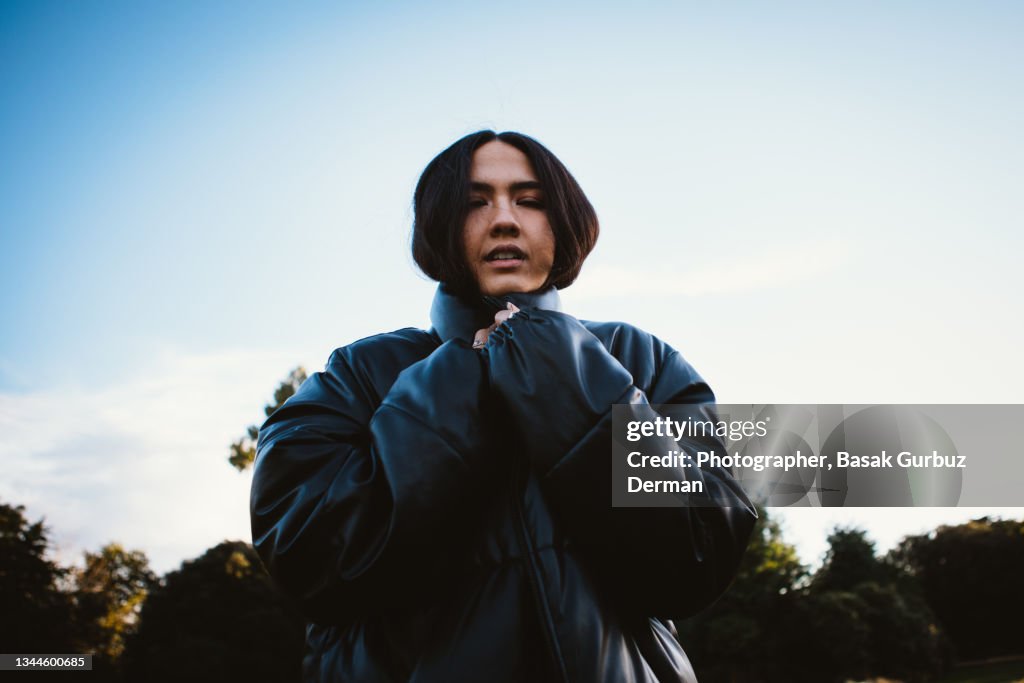 Shot of a beautiful young woman wearing a coat on a cold day, posing outdoors