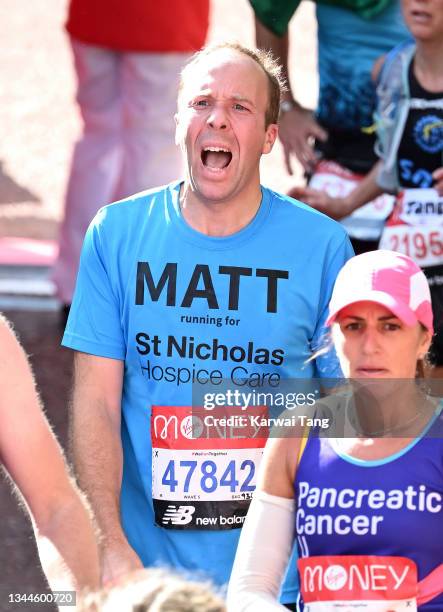 Matt Hancock completes the London Marathon 2021 in The Mall on October 03, 2021 in London, England.