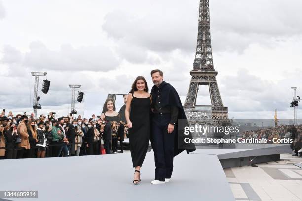 Nicolaj Coster Waldau and daughter Filippa Coster-Waldau walk the runway during the "Le Defile L'Oreal Paris 2021" Womenswear Spring/Summer 2022 show...