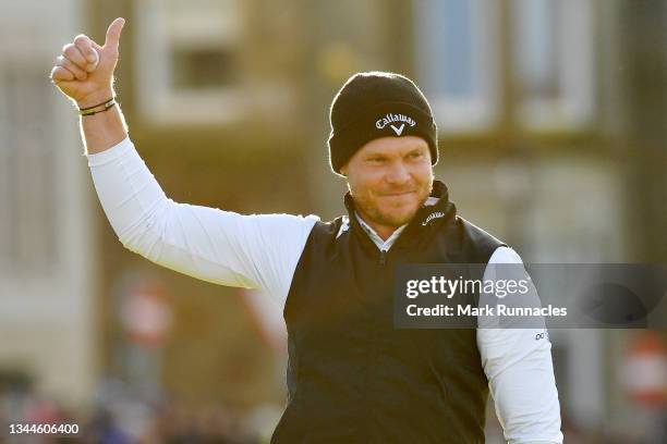 Danny Willett of England celebrates on the 18th green following his round during Day Four of The Alfred Dunhill Links Championship at The Old Course...