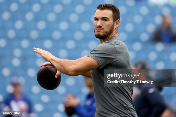 Mitchell Trubisky of the Buffalo Bills warms up before the game against the Houston Texans at Highmark Stadium on October 03, 2021 in Orchard Park,...