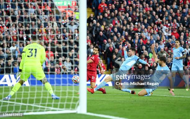 Mohamed Salah of Liverpool scores their team's second goal during the Premier League match between Liverpool and Manchester City at Anfield on...