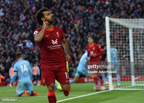 Mohamed Salah of Liverpoolcelebrates after scoring the second goal during the Premier League match between Liverpool and Manchester City at Anfield...