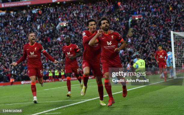 Mohamed Salah of Liverpoolcelebrates after scoring the second goal during the Premier League match between Liverpool and Manchester City at Anfield...