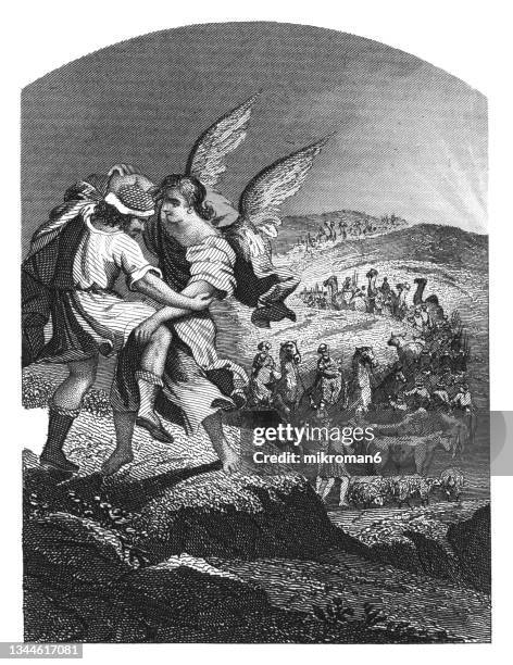 old engraved illustration of jacob wrestles with an angel - jacob stock-fotos und bilder