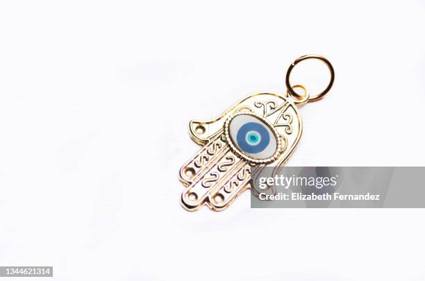hamsa evil eye, the hand for good luck or the hand of fatima, on white background - hamsa amulet stock pictures, royalty-free photos & images
