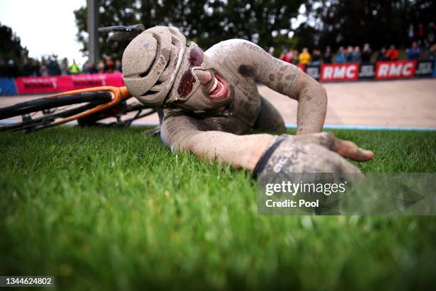 Sonny Colbrelli of Italy and Team Bahrain Victorious covered in mud celebrates winning in the Roubaix Velodrome - Vélodrome André Pétrieux after the...