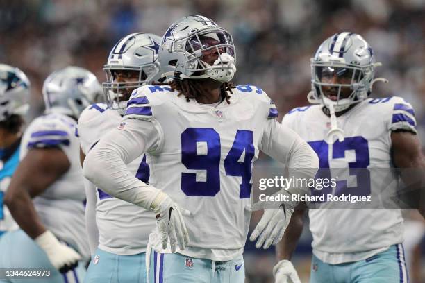 Randy Gregory of the Dallas Cowboys celebrates a sack during the first half against the Carolina Panthers at AT&T Stadium on October 03, 2021 in...