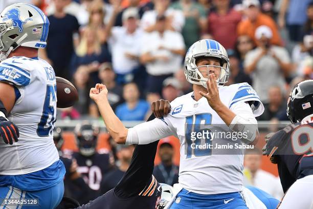 Robert Quinn of the Chicago Bears forces a fumble on a third and goal pass attempt by quarterback Jared Goff of the Detroit Lions in the second...