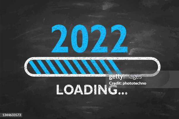 loading new year 2022 on chalkboard background - living will document stock illustrations