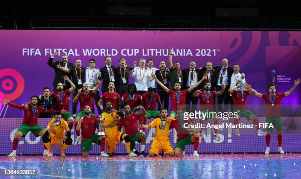 Players and Staff of Portugal celebrates after winning the FIFA Futsal World Cup following the FIFA Futsal World Cup 2021 Final match between...