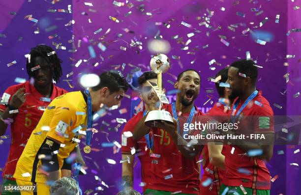 Pauleta of Portugal celebrates with the FIFA Futsal World Cup following the FIFA Futsal World Cup 2021 Final match between Argentina and Portugal at...