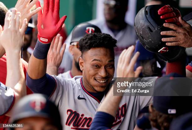 Jorge Polanco of the Minnesota Twins celebrates his three-run home run with teammates in the first inning against the Kansas City Royals at Kauffman...
