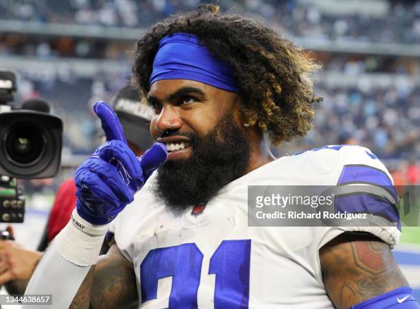 Ezekiel Elliott of the Dallas Cowboys leaves the field walks off the field after defeating Carolina Panthers at AT&T Stadium on October 03, 2021 in...