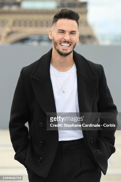 Baptiste Giabiconi poses on the runway after the "Le Defile L'Oreal Paris 2021" Womenswear Spring/Summer 2022 show as part of Paris Fashion Week on...