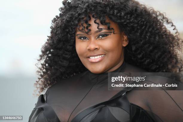 Yseult poses on the runway after the "Le Defile L'Oreal Paris 2021" Womenswear Spring/Summer 2022 show as part of Paris Fashion Week on October 03,...