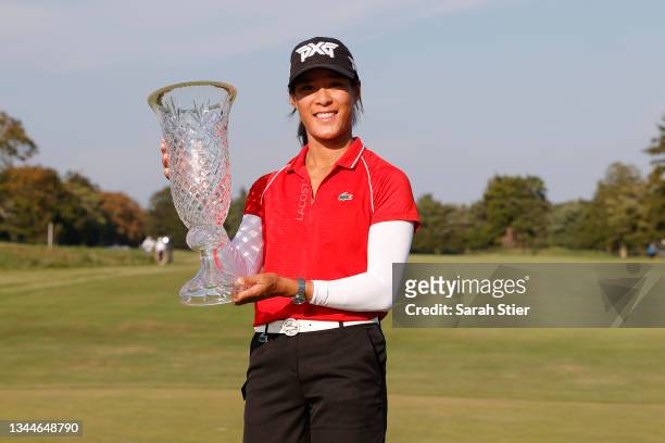 Celine Boutier of France poses with the trophy after winning the ShopRite LPGA Classic presented by Acer on the Bay Course at Seaview Golf Club on...