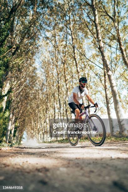 man on mountain bike in the nature - wielrennen stockfoto's en -beelden