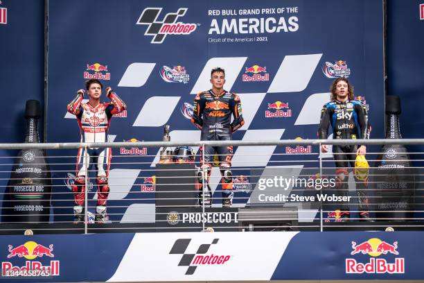 Moto2 podium with Moto2 rider Raul Fernandez of Spain and Red Bull KTM Ajo , Moto2 rider Fabio Di Giannantonio of Italy and Federal Oil Gresini Moto2...