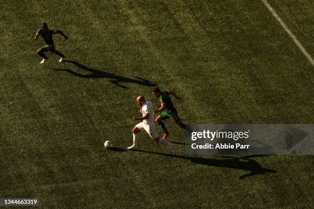 Gonzalo Higuain of Inter Miami controls the ball against Jose van Rankin of Portland Timbers in the second half at Providence Park on October 03,...