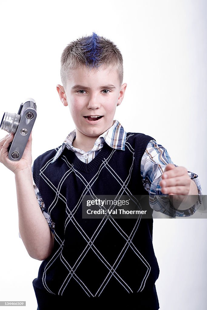 Boy with old camera