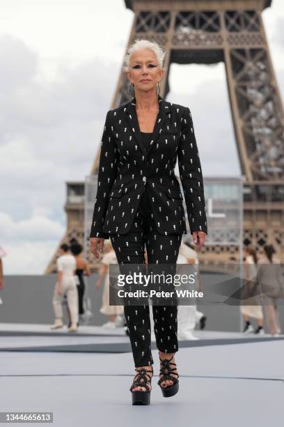 Dame Helen Mirren walks the runway during the "Le Defile L'Oreal Paris 2021" Womenswear Spring/Summer 2022 show as part of Paris Fashion Week on...