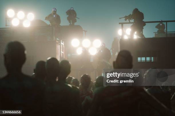 zombie apocalypse - crowd barricade stock pictures, royalty-free photos & images