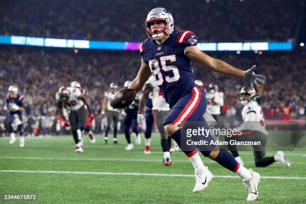 Hunter Henry of the New England Patriots celebrates after scoring a touchdown against the Tampa Bay Buccaneers during the second quarter in the game...