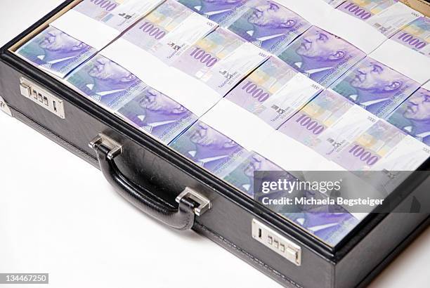 briefcase full of swiss francs, bills - boodle stock pictures, royalty-free photos & images