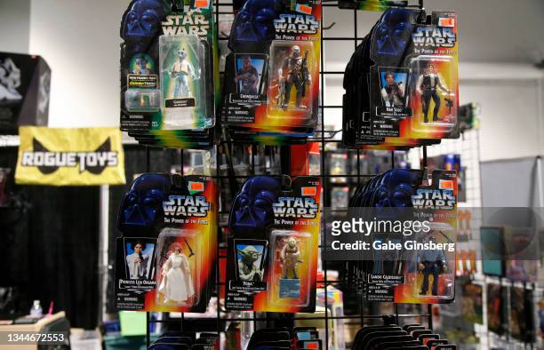 Action figures based on the "Star Wars" movie franchise are displayed in the Rogue Toys booth during Unicon 2021 at the World Market Center on...