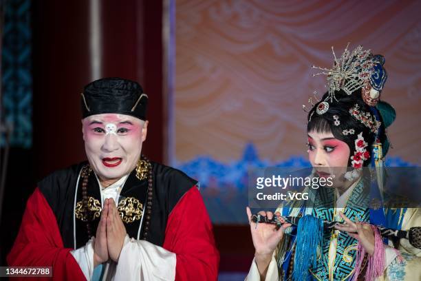Artists perform on the stage during the 5th Chinese Opera Culture Week at Beijing Garden Expo Park on October 2, 2021 in Beijing, China.