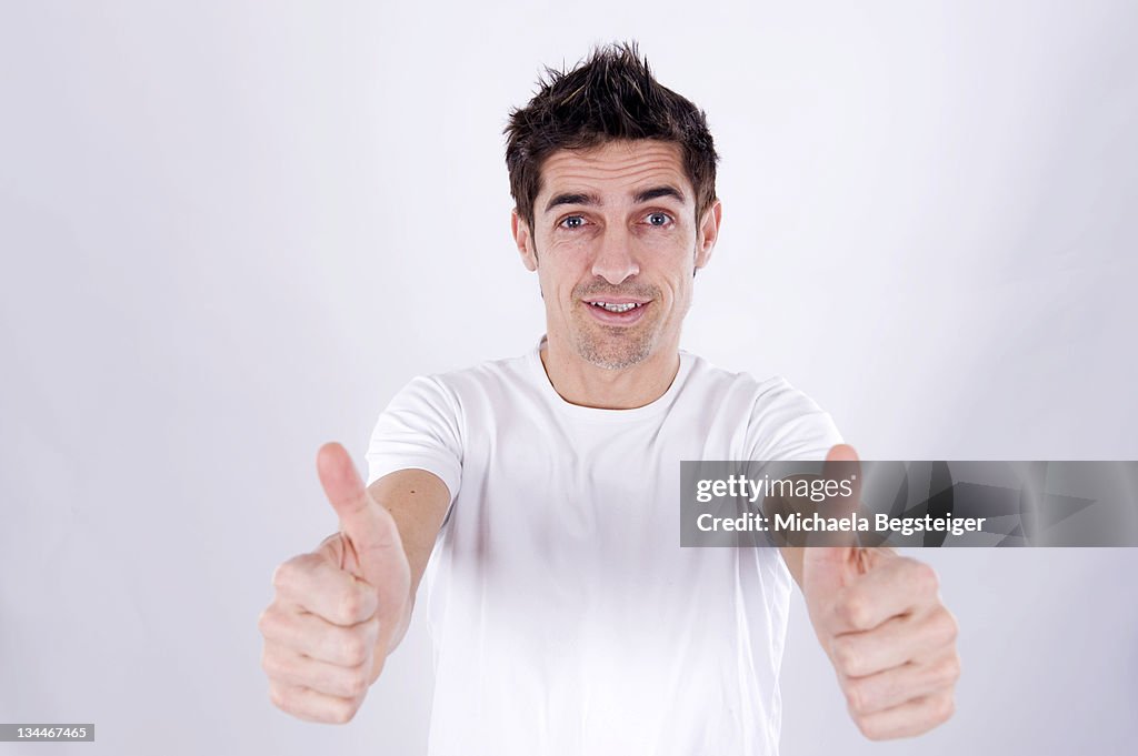 Man with thumbs up