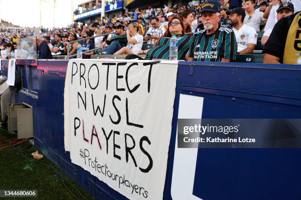 Signage supporting NWSL players is seen during a game between the Los Angeles Galaxy and the Los Angeles FC at Dignity Health Sports Park on October...